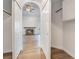 View of a closet that looks into the living room with a fireplace at 8113 Dolphin Landing Dr, Las Vegas, NV 89128