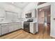 Bright kitchen with stainless steel appliances and a seamless transition into the living room at 8113 Dolphin Landing Dr, Las Vegas, NV 89128