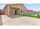 Backyard with covered patio, lush artificial turf and a refreshing swimming pool at 820 Wintersweet Rd, Henderson, NV 89015