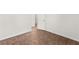 Bright room features brown tile flooring and a white door at 820 Wintersweet Rd, Henderson, NV 89015