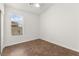 Bright bedroom features a window for natural light and tile flooring at 820 Wintersweet Rd, Henderson, NV 89015