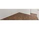 A bright room features brown tile flooring and crisp white baseboards at 820 Wintersweet Rd, Henderson, NV 89015