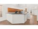 Kitchen with stainless appliances, tile floors, and breakfast bar at 820 Wintersweet Rd, Henderson, NV 89015