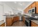 Kitchen featuring granite countertops and stainless-steel appliances at 820 Wintersweet Rd, Henderson, NV 89015