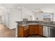 Open kitchen boasts granite counters and stainless steel appliances at 820 Wintersweet Rd, Henderson, NV 89015