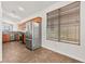 Kitchen featuring stainless steel appliances and tile flooring at 820 Wintersweet Rd, Henderson, NV 89015