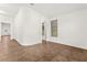 Bright and spacious living room with tile flooring and natural light, enhancing a cozy atmosphere at 820 Wintersweet Rd, Henderson, NV 89015