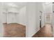 Living room area with neutral paint, tile flooring and a doorway at 820 Wintersweet Rd, Henderson, NV 89015