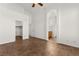 Spacious primary bedroom with tiled flooring, ensuite bath, and walk-in closet at 820 Wintersweet Rd, Henderson, NV 89015