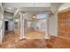 Welcoming entryway featuring terracotta tile floors, wood door, and decorative columns at 8470 S Pioneer Way, Las Vegas, NV 89113