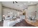 Open-concept living area features a stylish design with hardwood floors and modern furnishings at 8470 S Pioneer Way, Las Vegas, NV 89113