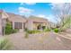 Home exterior showcasing the desert landscaped backyard at 8620 Prairie Hill Dr, Las Vegas, NV 89134