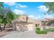 Charming single-story home featuring a well-manicured front yard and a two-car garage at 8620 Prairie Hill Dr, Las Vegas, NV 89134