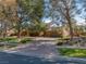 Charming home with mature trees, desert landscaping and brick driveway at 9 Quail Run Rd, Henderson, NV 89014