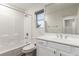 Bright bathroom featuring a shower-tub combo, vanity with ample storage, and modern fixtures at 9006 Cedar Door Ave, Las Vegas, NV 89148