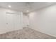 Neutral bedroom with ceiling fan, plush carpet, double doors, and recessed lighting offers a cozy retreat at 9006 Cedar Door Ave, Las Vegas, NV 89148