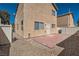 Enclosed backyard featuring a patio, providing a private outdoor living space at 9465 Milkweed Canyon Ave, Las Vegas, NV 89166