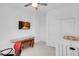 Bright bedroom featuring a work space, and white storage at 9608 Bloodstone Ln, Las Vegas, NV 89143