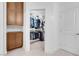 Spacious walk-in closet with custom shelving and ample storage space at 9608 Bloodstone Ln, Las Vegas, NV 89143