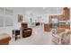 Spacious living space with tile flooring, dining area, stainless steel appliances and comfortable seating at 9608 Bloodstone Ln, Las Vegas, NV 89143