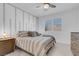 Serene main bedroom with a neutral color scheme, decorative wall trim and plantation shutters at 9608 Bloodstone Ln, Las Vegas, NV 89143