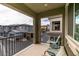 Balcony with a view of neighborhood homes and mountains in the distance at 965 Nevada State Dr # 24201, Henderson, NV 89002