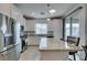 Bright kitchen featuring stainless steel appliances, granite countertops, and ample natural light at 965 Nevada State Dr # 24201, Henderson, NV 89002