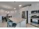 Modern kitchen featuring stainless steel appliances and a view to the dining area at 965 Nevada State Dr # 24201, Henderson, NV 89002