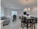 Open-concept living room featuring dining and living areas at 965 Nevada State Dr # 24201, Henderson, NV 89002