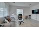 Comfortable living room boasts bright windows, a cozy sofa, and modern furnishings at 965 Nevada State Dr # 24201, Henderson, NV 89002