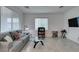 Inviting living room features large windows providing ample natural light and cozy seating at 965 Nevada State Dr # 24201, Henderson, NV 89002