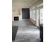 Open-concept living space with access to the backyard and modern finishes at 9758 Panther Hollow St, Las Vegas, NV 89141