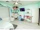 Bright bedroom featuring updated floors, desk space, and ample natural light at 1017 Fairbury St, Henderson, NV 89052