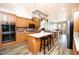 Modern kitchen with stainless steel appliances, a center island, and ample counter space for food preparation at 1017 Fairbury St, Henderson, NV 89052