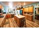 Open kitchen featuring a central island, stainless appliances, and eat-in area at 1017 Fairbury St, Henderson, NV 89052