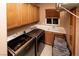 Functional laundry room with modern washer and dryer units at 1017 Fairbury St, Henderson, NV 89052
