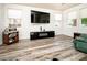 Relaxing living area with a modern entertainment center, providing a cozy space for relaxation at 1017 Fairbury St, Henderson, NV 89052
