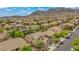 Neighborhood two-story home with desert landscaping and mountain backdrop at 10385 Grassyrock Ct, Las Vegas, NV 89129