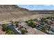 Beautiful aerial view of homes near mountains in a well-maintained neighborhood setting at 10385 Grassyrock Ct, Las Vegas, NV 89129