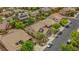 Two-story home with desert landscaping and nearby street parking at 10385 Grassyrock Ct, Las Vegas, NV 89129