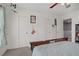 The bedroom features sliding-door closets and a ceiling fan with light fixture at 10385 Grassyrock Ct, Las Vegas, NV 89129