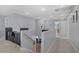 Upstairs hallway featuring plush carpet, gray walls, and recessed lighting at 10385 Grassyrock Ct, Las Vegas, NV 89129