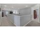 Second floor hallway offering easy access to multiple rooms at 10385 Grassyrock Ct, Las Vegas, NV 89129