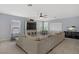 Comfortable carpeted living room offering modern design elements and a relaxing atmosphere at 10385 Grassyrock Ct, Las Vegas, NV 89129