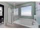 Bathroom featuring a shower and soaking tub at 1141 Cactus Rock St, Henderson, NV 89011
