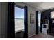 Bedroom featuring large windows with dark curtains and a view of the city at 1141 Cactus Rock St, Henderson, NV 89011