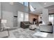 Bright living room with high ceilings, large windows, and modern decor at 1141 Cactus Rock St, Henderson, NV 89011