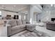 Spacious living room features an open floorplan with great room and modern staircase at 1141 Cactus Rock St, Henderson, NV 89011