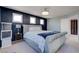 Comfortable main bedroom featuring recessed lighting, large windows, and accent wall at 1141 Cactus Rock St, Henderson, NV 89011