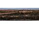 Wide, panoramic view of the city skyline from the undeveloped lot at 1141 Cactus Rock St, Henderson, NV 89011